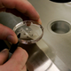 A scientist holding a dish with human embryos at the La Jolla IVF Clinic February 28, 2007 in La Jolla, California.